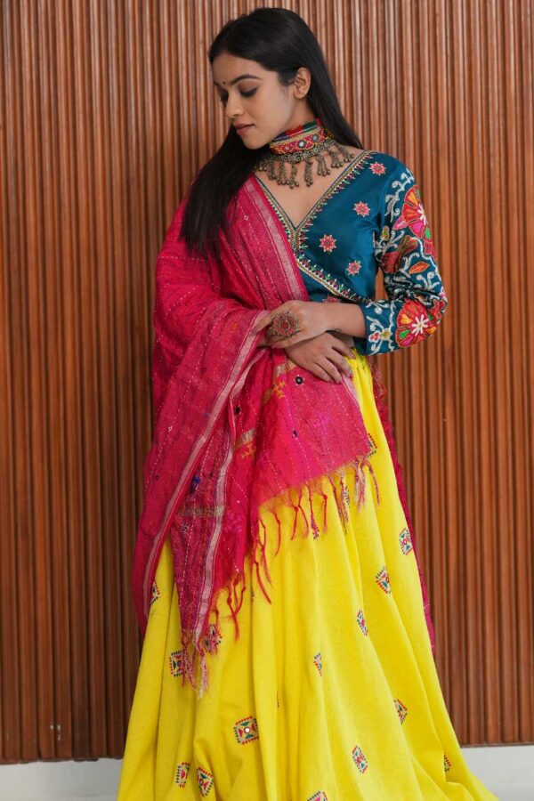 Jagruti Website 02-05 (1) Turquoise V-Neck Blouse with Yellow Patchwork Skirt