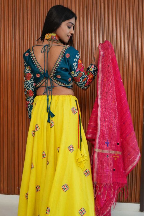 Jagruti Website 02-07 Turquoise V-Neck Blouse with Yellow Patchwork Skirt